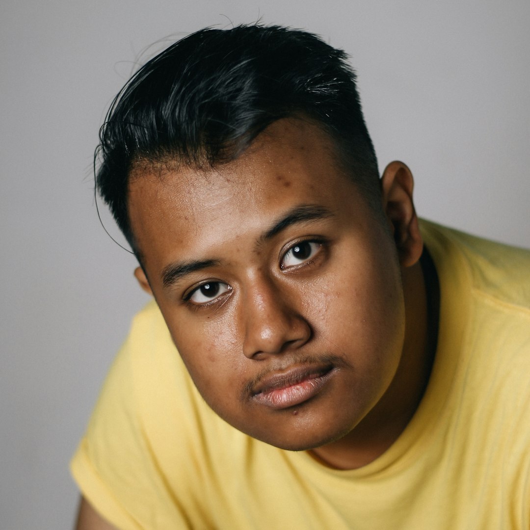 Studio portrait of a Latino man journalist