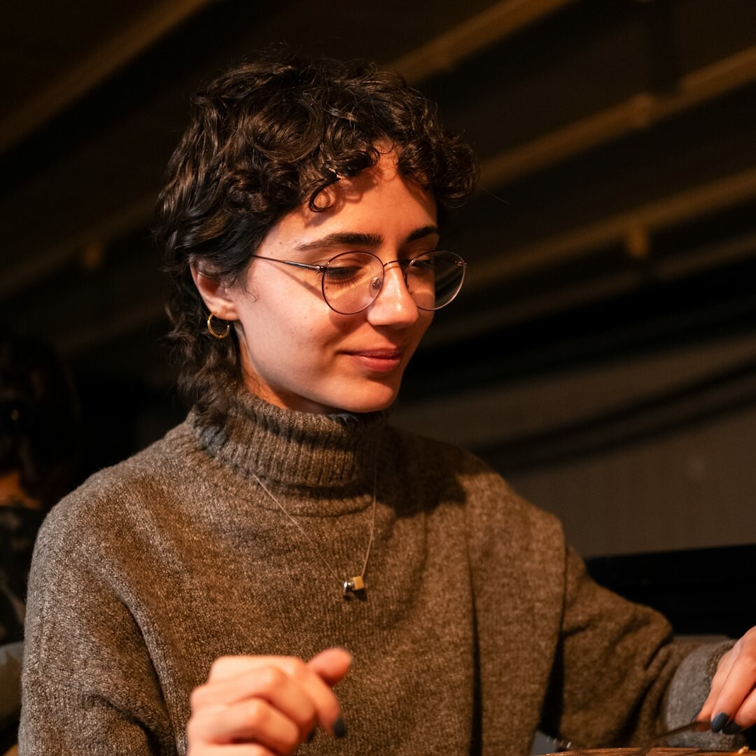 Portrait of a young actress smiling at a media event